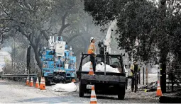  ?? BEN MARGOT/ASSOCIATED PRESS ?? PG &amp; E crews work on restoring power in October. The company will file for bankruptcy.