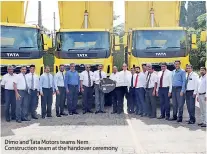  ??  ?? Dimo and Tata Motors teams Nem Constructi­on team at the handover ceremony