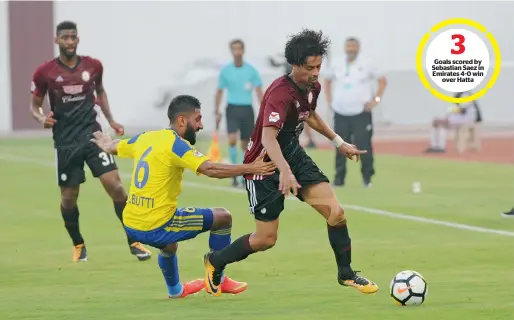  ?? Supplied photo ?? Players from Al Wahda and Al Dhafra compete for the ball during their Arabian Gulf League match on Friday. —