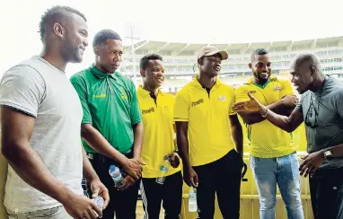  ??  ?? Gibbs Williams, Jamaica’s Lead Fitness Tester (right), has the full attention of Scorpion squad members from L-R: Aaron Johnson, Christoph Virgo (an U-19 player training with the Scorpions), Alwyn Williams, Aldain Thomas and Dennis Bulli.