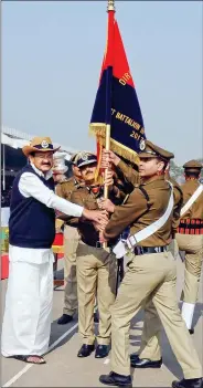  ?? IANS ?? Vice President M. Venkaiah Naidu gives away gallantry awards on the occasion of the 52nd Raising Day ceremony, in New Delhi on Friday.