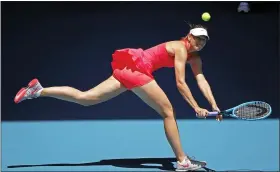  ?? LEE JIN-MAN — THE ASSOCIATED PRESS ?? Maria Sharapova makes a backhand return to Donna Vekic during their first-round match at the Australian Open in Melbourne, Australia, on Jan. 21.