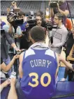  ?? Carlos Avila Gonzalez / The Chronicle 2016 ?? Stephen Curry answers questions from the media after a 2016 practice in Oklahoma City.