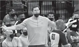  ?? Ronald Cortes / Getty Images /TNS ?? In this file photo, Sacramento Kings head coach Luke Walton complains about a call during action against the San Antonio Spurs at AT&T Center on March 29, 2021, in San Antonio,texas.