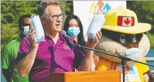  ?? LARRY WONG ?? Edmonton Heritage Festival Associatio­n executive director Jim Gibbon announces COVID-19 safety protocols in place for this weekend's event during a news conference Wednesday.
