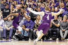  ?? Gerry Broome / Associated Press ?? Nathan Bain, left, hit the shot that shook college basketball and sparked $150,000 of donations to his hurricane-ravaged family.