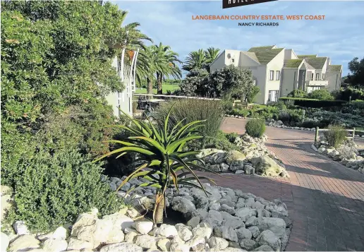  ?? Picture: Nancy Richards ?? SMART GARDEN The consciousl­y waterwise landscapin­g around the luxury suites features indigenous plants and rockery.