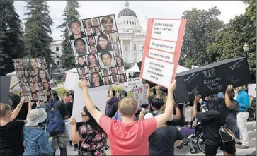  ?? Rich Pedroncell­i
Associated Press ?? GOV. JERRY BROWN and the Legislatur­e reached a compromise on lawmakers’ budget proposal within 24 hours. Above, advocates for the disabled call for funding for additional services at a protest in Sacramento.