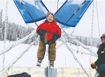  ?? PHOTOS: ROBIN ESROCK ?? Sun Peaks village is home to several kids activities including a ski bungee trampoline.