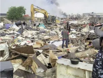  ?? ?? Demolition along the proposed Lagos - Calabr coastal road