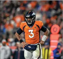  ?? AARON ONTIVEROZ — THE DENVER POST ?? Russell Wilson (3) of the Denver Broncos reacts to a failed reverse against the Los Angeles Chargers during the fourth quarter of the Broncos’ 31-28win at Empower Field at Mile High on Sunday, January 8, 2023.