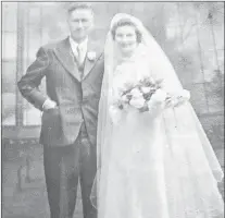  ?? SUBMITTED PHOTO ?? A faded wedding photo of the author’s parents, Joachim and Margaret (Wyse) Murray, married Nov. 6, 1941.