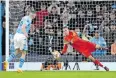  ?? EPA ?? REAL Madrid goalkeeper Andriy Lunin saves the penalty of Mateo Kovacic of Manchester City during Wednesday’s Champions League quarter-final penalty shoot-out.
|