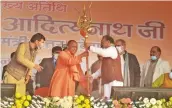  ?? — PTI ?? Uttar Pradesh chief minister Yogi Adityanath holds a trident during the Jan Vishwas Rally in Rampur on Saturday.