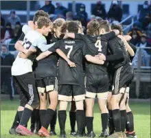  ?? PILOT PHOTO/MAGGIE NIXON ?? The Dragons huddle prior to the regional final game last week.