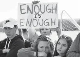 ?? RJ Sangosti, The Denver Post ?? Students at Columbine High School participat­e in Wednesday’s nationwide school walkout in protest of gun violence.