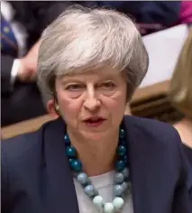  ?? (Photo AFP) ?? Theresa May, qui a annoncé le report du vote, se rendra à Bruxelles, jeudi pour faire valoir les préoccupat­ions des Britanniqu­es.