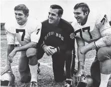  ?? ASSOCIATED PRESS FILE PHOTO ?? Notre Dame football coach Ara Parseghian, center, poses with quarterbac­k Joe Theismann, left, and All-America defensive tackle Mike McCoy, in Dallas, where the team was preparing for the Cotton Bowl in 1969. Parseghian, who took over a foundering Notre...