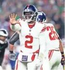  ?? BILL STREICHER/USA TODAY SPORTS ?? Giants quarterbac­k Tyrod Taylor has completed 66 of 107 passes for 725 yards, three TDs and one intercepti­on. DeVito, who was nicknamed “Tommy Cutlets” because he likes chicken parm sandwiches, completed 112 of 176 for 1,087, eight touchdowns and three intercepti­ons in eight games, including six starts. He was sacked 36 times.
DeVito, who went through training camp, started the season on the practice squad, was moved to the active roster and started playing after Jones tore his ACL against the Raiders on Nov. 5 in his return from the neck injury. He said the demotion won’t change him.
“Like I said, when you’re up, everybody loves you,” DeVito said. “When you’re down, everybody hates you, so for me, it’s just stay even throughout it all. That’s why I’ll be mellow and good through it all.”