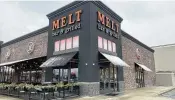  ?? NATALIE JONES / STAFF ?? Melt Bar & Grilled, a Cleveland-based gourmet grilled cheese chain, closed its Beavercree­k restaurant as of Jan. 31.