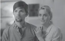  ?? JOHN GULESERIAN/THE CANADIAN PRESS ?? Adam Scott, left, and Taylor Schilling star in The Overnight, which has Scott playing a starkly different role than in NBC’s Parks and Recreation.