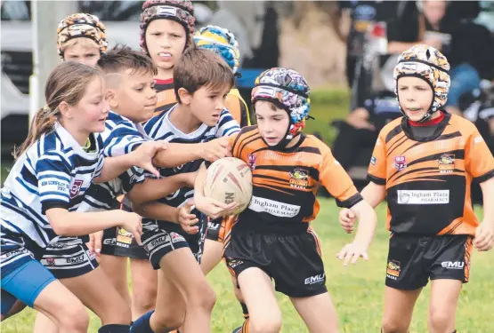  ??  ?? Herbert River Junior Rugby League U8 Nathan Clark against Townsville Brothers. Pictures: Cameron Bates