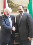  ??  ?? British Foreign Secretary Boris Johnson meets with Kuwaiti Minister for Cabinet Affairs Mohammed Al-Abdullah Al-Sabah.