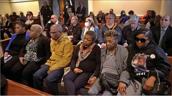  ?? HERALD POOL PHOTO ?? Family members of Tyler Lawrence, including his mother Remy Lawrence (second from left ), his grandparen­ts and friends, sit In the courtroom for the arraignmen­t of Csean Skerritt, 34, who was arraigned in Dorchester Boston Municipal Court yesterday.