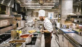  ??  ?? A chef prepares orecchiett­e pasta at the high-end resort Borgo Egnazia. SD Hotels, turns traditiona­l Italian farmhouses into resorts that focus on fitness and otherworld­ly spa treatments in addition to traditiona­l Italian fare.