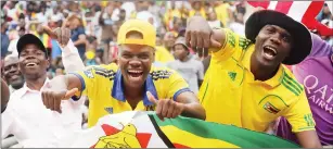  ??  ?? WE’VE . . . soccer fans bask in the glory of the Warriors qualificat­ion for the 32nd African Cup of DONE IT Nations finals