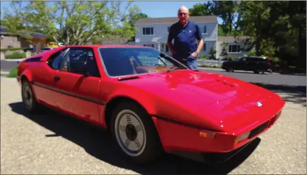  ?? DAVID KRUMBOLTZ — STAFF ?? Alamo resident Dick Glass appears recently with his very aerodynami­c 1980BMW M1that he has owned for 20years.