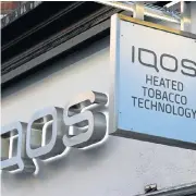  ?? /Reuters ?? Smoke without fire: An IQOS e-cigarette outlet in London. Philip Morris introduced the device to SA in April 2017 and the product targets the more affluent market.