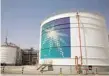  ?? — Reuters ?? Oil tanks seen at the Saudi Aramco headquarte­rs in Damam city, Saudi Arabia.