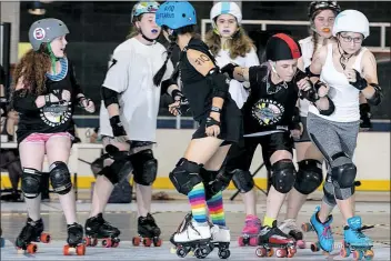  ?? PHOTO BY JOSHUA M HOOVER PHOTOGRAPH­Y ?? Members from the Southern Maryland junior roller derby participat­e in a Saturday morning practice at the Capital Clubhouse in Waldorf. The team practices every Saturday for two hours 11 months out of the year.