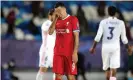  ??  ?? Roberto Firmino, who did not start against Real Madrid, contemplat­es Liverpool’s defeat in midweek. Photograph: Isabel Infantes/PA