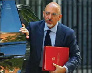  ?? (AFP) ?? File photo dated July 5, 2022 shows Britain’s then Education Secretary Nadhim Zahawi arriving to attend a cabinet meeting in Downing Street in London. British Prime Minister Rishi Sunak on Sunday fired Zahawi after an inquiry into his tax affairs found a “serious breach” of ministeria­l rules, the government said.