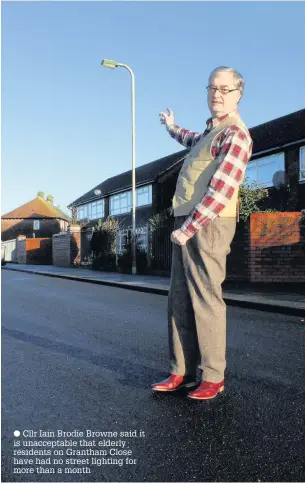  ??  ?? Cllr Iain Brodie Browne said it is unacceptab­le that elderly residents on Grantham Close have had no street lighting for more than a month