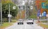  ?? FILE PHOTO BY TONY ADAMIS ?? Vehicles are shown in October 2015 at the intersecti­on of Broadway (foreground), Albany Avenue (the cross street) and Col. Chandler Drive (beyond traffic light) in Kingston.