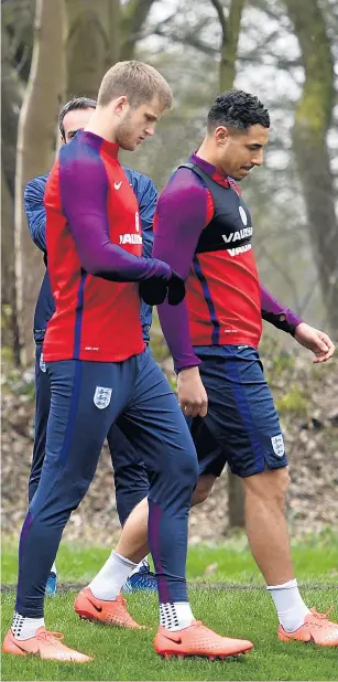  ??  ?? Special guest: Eddie Jones watches England’s training session yesterday before giving a talk to the squad