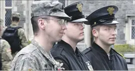  ?? Richard Drew Associated Press ?? CADETS AND BROTHERS Noah, Cole and Sumner Ogrydziak, from left, are the first three siblings to graduate the military academy together since 1985.