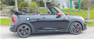  ?? BRIAN HARPER/DRIVING ?? The 2017 Mini John Cooper Works Convertibl­e is billed as combining the carefree feeling of a convertibl­e with the handling of a sports car. But BMW pricing applies: This model starts at $40,240.