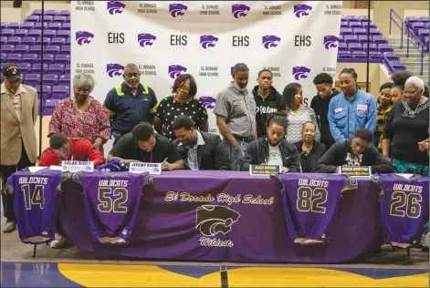  ?? Contribute­d Photo ?? Wildcats sign: Four El Dorado football players finalized their college plans Wednesday at a ceremony at Wildcat Arena. From left to right, Calab Scott and Jeremy Boone sign with Ouachita Baptist, while Alex Boone and Chris Newton sign with Arkansas-Pine Bluff.