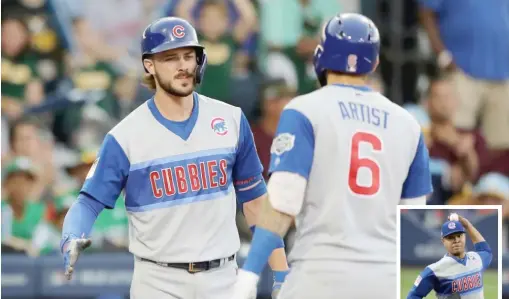  ?? GETTY IMAGES (ABOVE), AP ?? Kris Bryant (above, left) congratula­tes Nick Castellano­s after his solo home run in the first inning Sunday against the Pirates during the MLB Little League Classic. Jose Quintana (right) pitched seven scoreless innings.