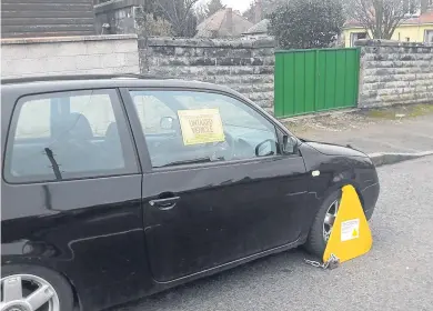  ??  ?? The DVLA clamped dozens of cars parked across the city including ones parked at Mains Loan, Helmsdale Avenue and Helmsdale Drive.