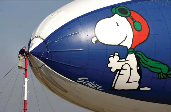  ?? CASEY CHRISTIE/THE ASSOCIATED PRESS FILE PHOTO ?? Snoopy will no longer be the face of MetLife after more than three decades of appearing on the insurance company’s blimps and in its commercial­s.