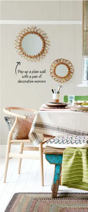  ?? ?? Pep up a plain wall with a pair of decorative mirrors