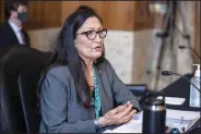  ?? (AP)/Graeme Jennings) ?? Rep. Deb Haaland, D-N.M., nominated to be secretary of the Interior, appears Tuesday before the Senate Committee on Energy and Natural Resources in Washington. If confirmed, she would be the first American Indian to lead a Cabinet agency.