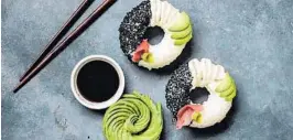  ?? SAM MURPHY/AP ?? Sam Murphy, a Melbourne, Australia-based vegan cookbook author, says she invented sushi doughnuts last summer.