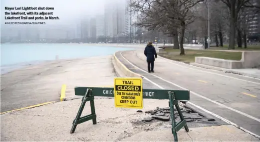  ?? ASHLEE REZIN GARCIA/SUN-TIMES ?? Mayor Lori Lightfoot shut down the lakefront, with its adjacent Lakefront Trail and parks, in March.