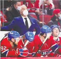  ?? JOHN MAHONEY ?? Canadiens head coach Dominique Ducharme checks the clock during Tuesday's 5-0 loss to the Sharks.